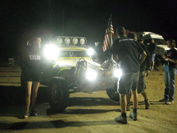While racing in the 2013 General Tire Vegas to Reno race, Alexander Motorsports and their competitors raced during daylight and under darkness. in a rugged and unforgiving desert terrain