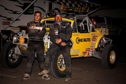 (Left to right) Gavin Ferguson and Steve Alexander chilling on their new official KC HiLiTES race vehicle.