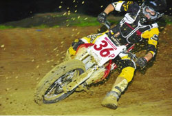 Adam churning up the muck in a race at Galesburg, Illinois last year.