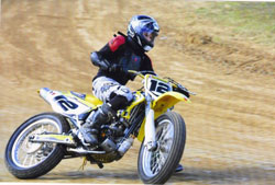 Same form and technique, but different surface, Allyx racing in the 250 class last year at Walnut, Illinois race last season.