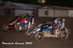 Swanson in a heat race with Pricket in Hanford, California. Photo by Patrick Grant.