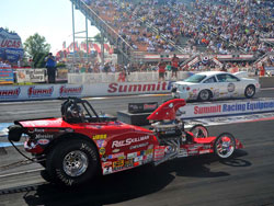 David Rampey drives a red '32 Bantam roadster in the NHRA Competition Eliminator class