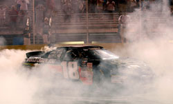 Max Gresham does a burnout at Gresham Motorsports Park after he won his first K&N Pro Series East race of the season.