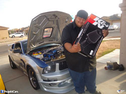 With K&N Ford Mustang GT air intake in hand, Louie Bustillos shows us how much he loves performance.