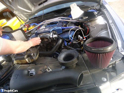 Now that Louie Bustillos has removed the stock airbox, it is time to install his K&N Mustang GT air intake system.