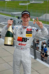 After his second place finish at the Red Bull Ring Lewis is either signaling his results or requesting a second bottle.