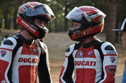 Greg Tracy and Alexander Smith chat at the start line area during a private testing session on the mountain.
