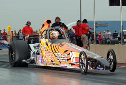 Not the car he built for 8.90 racing, Phillips takes his bracket dragster to the Quick Rod final in its first event. Photos by: IHRA Communications.
