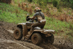 UTV and ATV racer Zac Zakowski working his off-road 2013 Can-am Commander 1000 through the trails